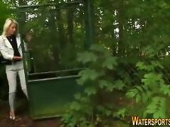 Clothed ho drinks urine